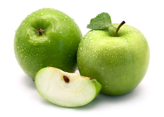 Green apples isolated on white background. Whole and slice.