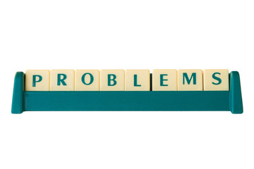 Alphabet game letter tiles on a stand forming the word 