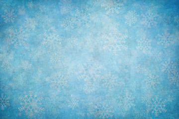 Blue winter background with snow flakes