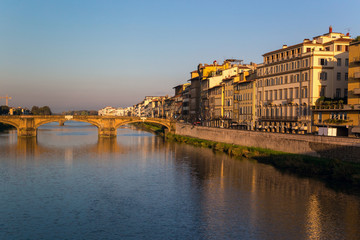 Fototapeta na wymiar View of the embankment of the river Arno in Florence