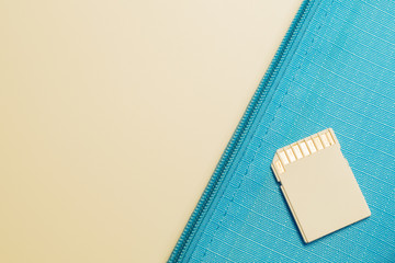 Memory card isolated on blue background. Sd card and copy space