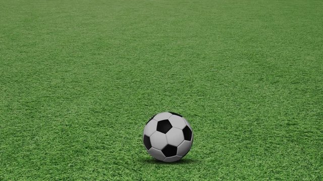 Conceptual rolling soccer ball on green football field. 