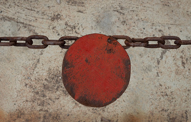 Cadena con un círculo rojo  para prohibir el paso.
