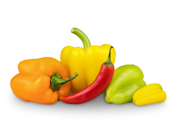 composition of five sweet and spicy red, yellow, green peppers isolated on a white background.