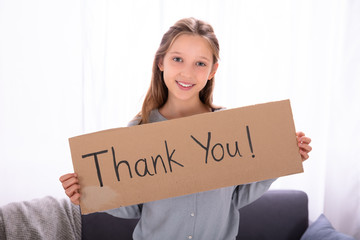 Girl Holding Thank You Placard