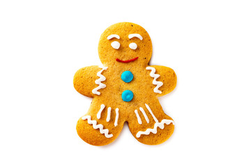 Smiling single gingerbread man christmas cookie isolated at white background.