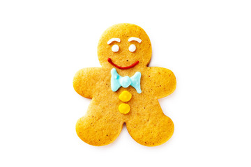 Smiling single gingerbread man christmas cookie isolated at white background.