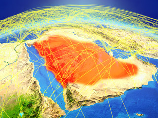 Saudi Arabia on planet Earth with international network representing communication, travel and connections.