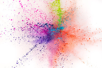 Colored powder explosion on white background.