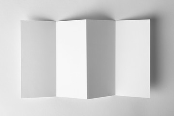 Blank brochure mock up on white background, top view