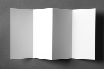 Blank brochure mock up on color background