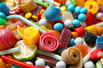 Many different yummy candies as background, closeup