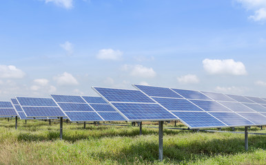 rows array of polycrystalline silicon solar cells or photovoltaic cells in solar power plant turn up skyward absorb the sunlight from the sun