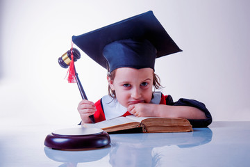 Justice goddess Themis, lady justice Femida concept. Humorous portrait of cute little child girl as...