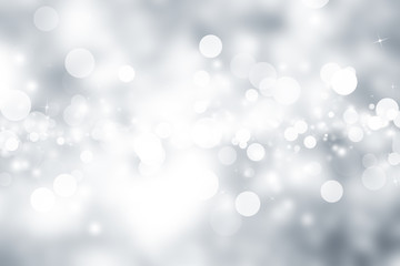 white snow blur abstract background. Bokeh Christmas blurred beautiful shiny Christmas lights. white and gray winter backdrop.