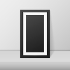 Vector 3d Realistic Modern Interior Black Blank Vertical Wooden Poster Picture Frame on Table, Shelf Closeup on White Wall, Mock-up. Empty Poster Frame Design Template for Mockup, Presentation