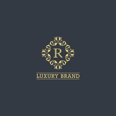 Fototapeta na wymiar Luxury logo template vector golden vintage flourishes ornament. logo design inspiration