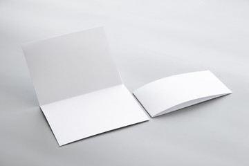 Blank portrait mock-up paper. brochure magazine isolated on gray, changeable background / white paper isolated on gray