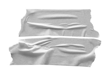 Set of white scotch tapes on gray background. Torn horizontal and different size white sticky tape, adhesive pieces.