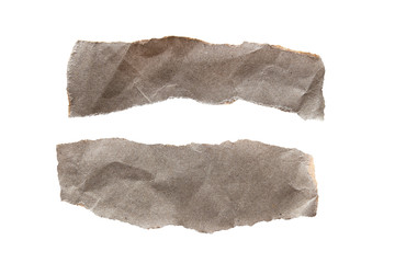 Brown corrugated texture paper torn on white background. rip of cardboard sheet used as a...