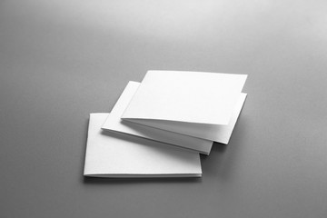 Blank portrait mock-up paper. brochure magazine isolated on gray, changeable background / white paper isolated on gray