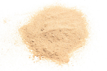 sand on white background. grain of sand