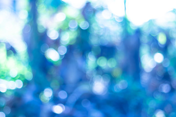 Blue blurred backdrop of nature, circle light wallpaper, white bokeh background