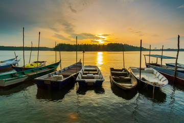 Fototapeta premium sunrise scenery at lumut,malaysia.soft focus,blur due to long exposure. visible noise due to high ISO.