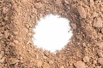 brown earth on white background. natural soil texture. Pile heap of soil humus isolated on white background