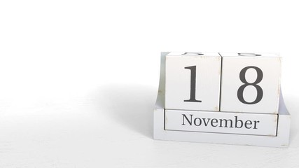 November 18 date on wooden blocks calendar. 3D animation