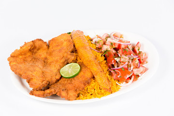 Ecuadorian national dish with rice, deep-fried fish, fried banana and vegetable salad 