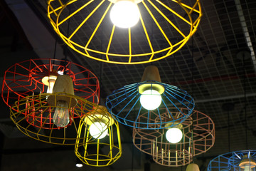 Set of light bulbs in the colorful grille hanging lamps
