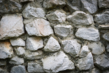 wall stone texture background / the rock wall seamless texture