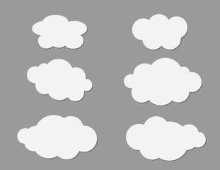 A set of white clouds clip arts on dark gray background vector illustration