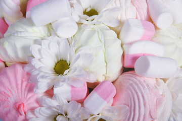 Flower arrangement bouquet of chrysanthemums and colored marshmallows.