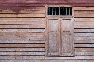 Walls and windows, stained wood and old brown stains in rural areas.