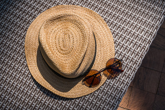 Hats and sunglasses are an important accessory for vacationers.