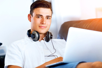Man working on laptop at home