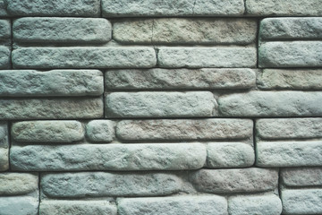 Old grunge orange brick background.