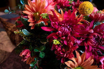 Harvest Basket Flower Arrangement, Multiple Flowers and Colors Reflecting Fall Season