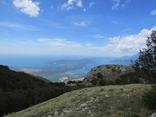Fototapeta na wymiar Aerial view to the Bay of Kotor from Lovcen national park under cloudly sky, Montenegro