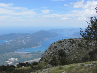 Fototapeta premium Aerial view to the Bay of Kotor from Lovcen national park under cloudly sky, Montenegro