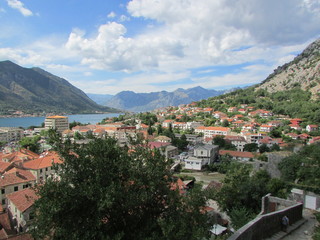 Fototapeta premium Panoramic view of Kotor old town and Kotor bay from city wall, Montenegro