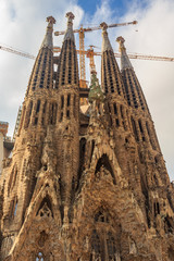 Facade of the famous Sagrada Familia Cathedral, building designed by Antoni Gaudi, which is being build since March 19, 1882. one of main tourist attractions in Barcelona, Spain
