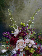 Obraz na płótnie Canvas bouquet of white roses and burgundy flowers