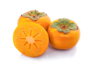 Tropical fruit persimmon. Kaki with leaves on white background.