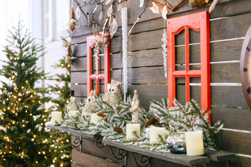 New Year's festive facade of a wooden house, decor for the holiday