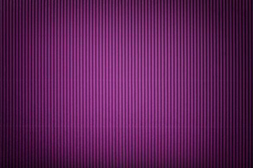 Texture of corrugated violet paper with vignette, macro.