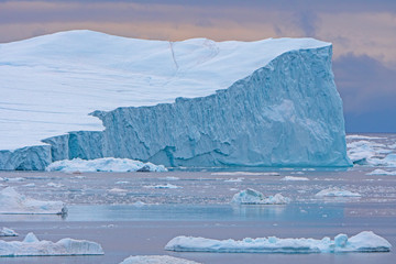 Dramatic Iceberg in Evening Light