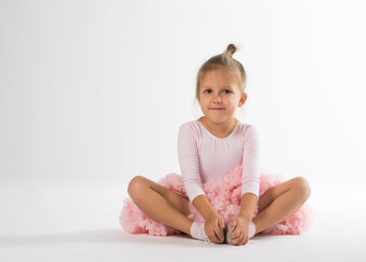 The little girl of four years is engaged in dancing